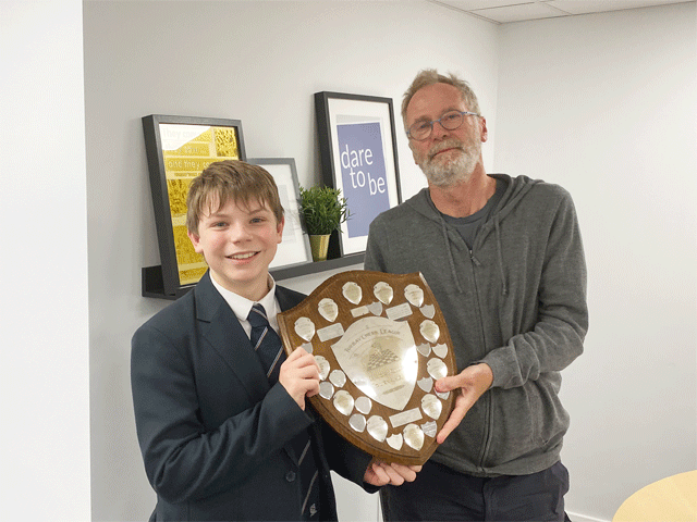 Division B was tied between South Hams and Torquay Boys' Grammar School.  South Hams agreed that the trophy should go on display at the School, and here Andrew Kinder presents the Trophy to TBGS.