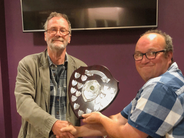 South Hams won the Division 3 title.  Andrew Kinder presents the Trophy to Ben Wilkinson, the South Hams team captain.